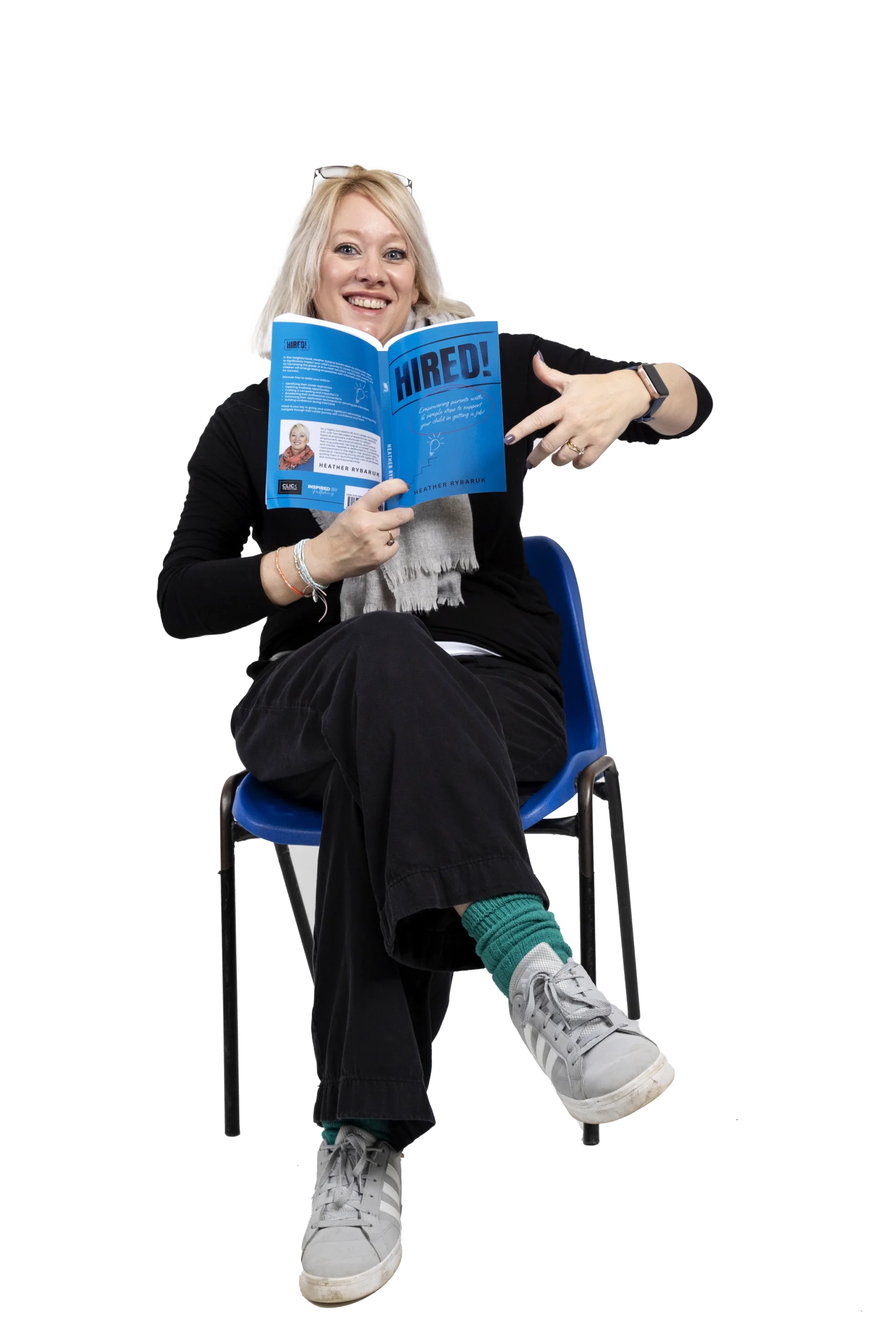 Heather, holding her book 'Hired!'